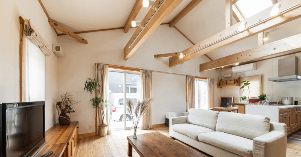 Large kitchen with high ceiling and skylight