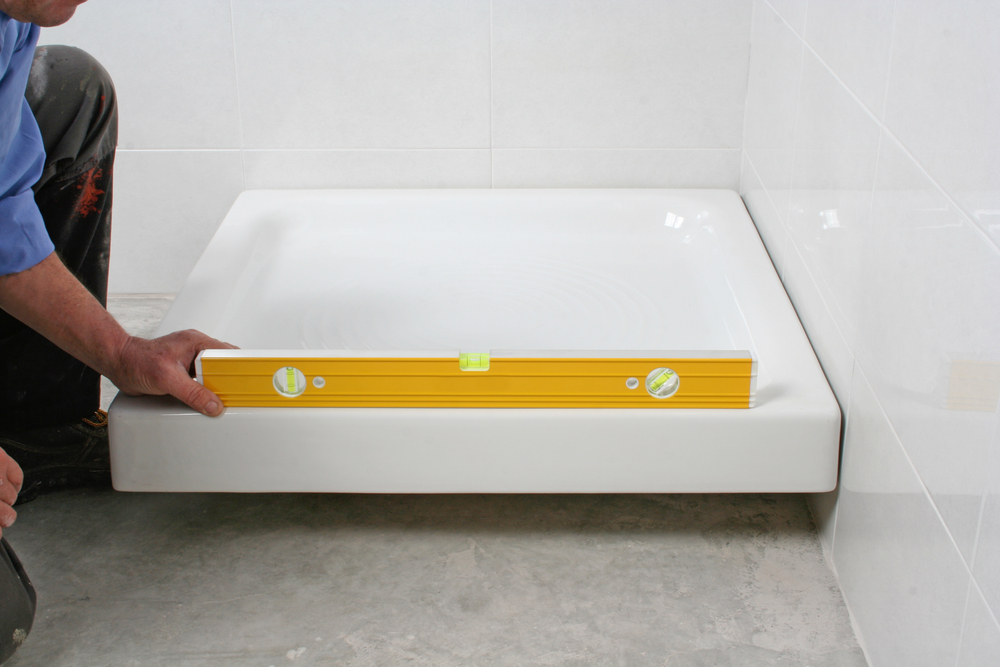 measure and level the shower tray